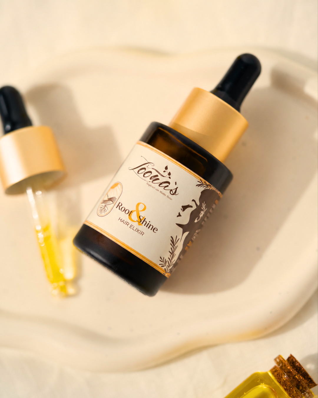 LOONAS Haaröl Root &amp; Shine Hair Elixir – Produktansicht mit natürlichen Zutaten